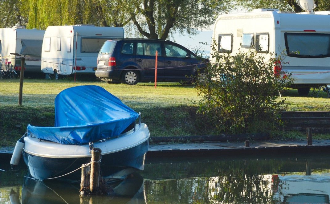 boat and camper in nature